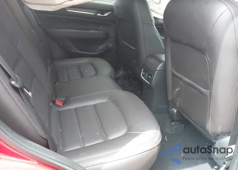 2021 Mazda Cx-5 Signature z USA, uszkodzony, nr VIN JM3KFBEY6M0419842